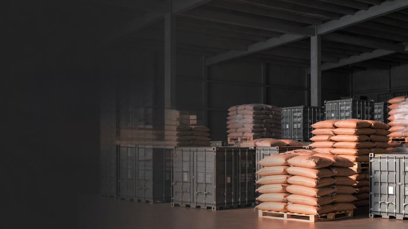 Bulk raw material sacks stacked for warehouse storage