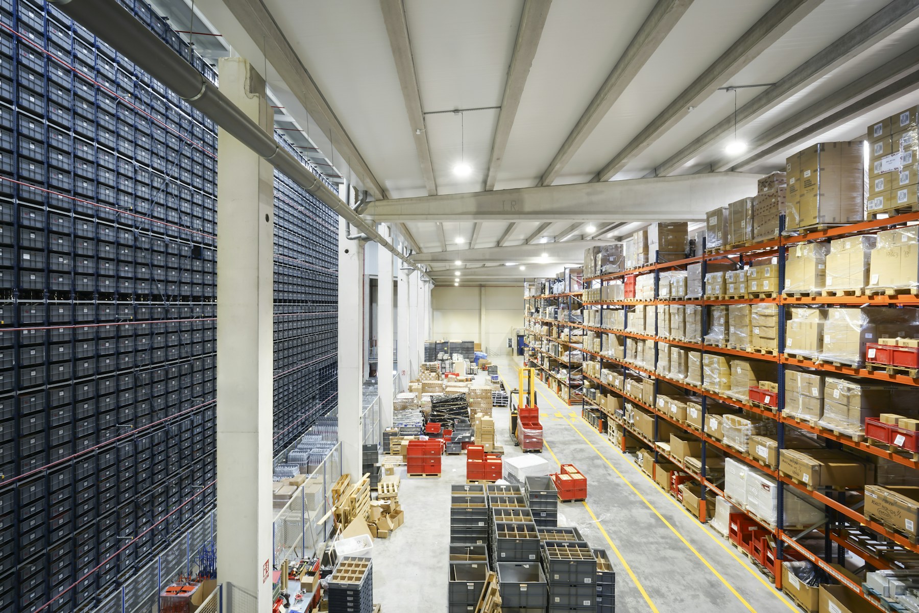 Modern, organised warehouse operations with industrial storage racks